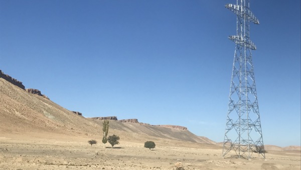 Transmission infrastructure in Midelt. Construction of the Noor Midelt solar installation was paused after site preparation because of the COVID-19 pandemic and financing issues. (Photo credit: Karen Rignall)