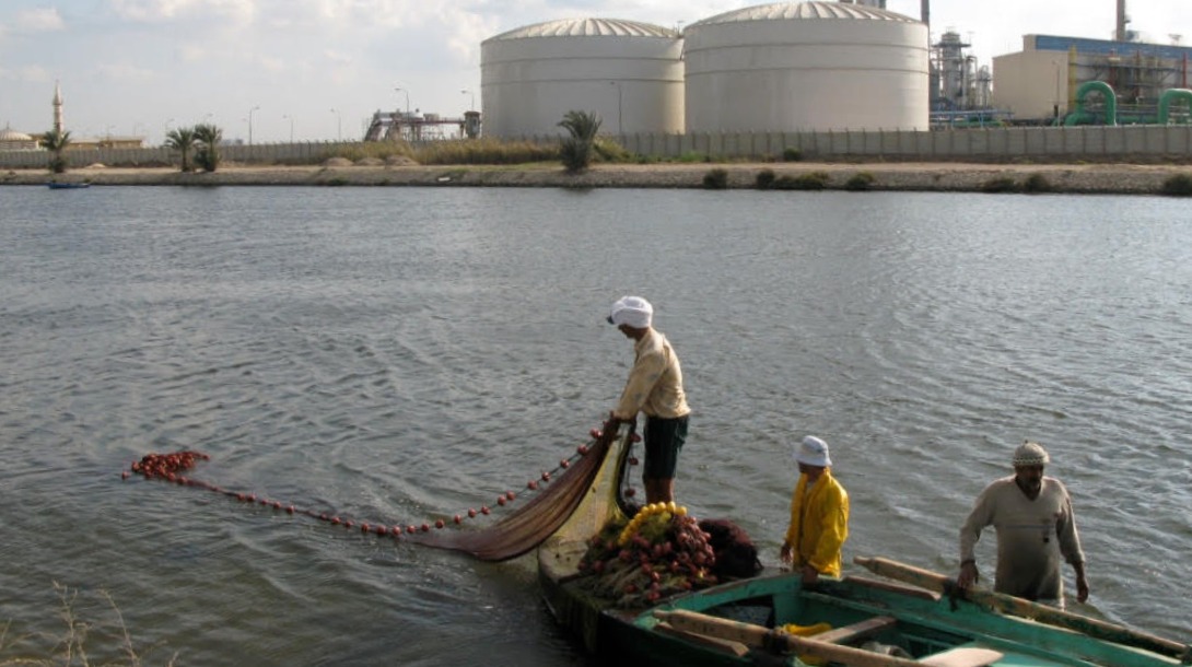 Fishermen in front of MOPCO.